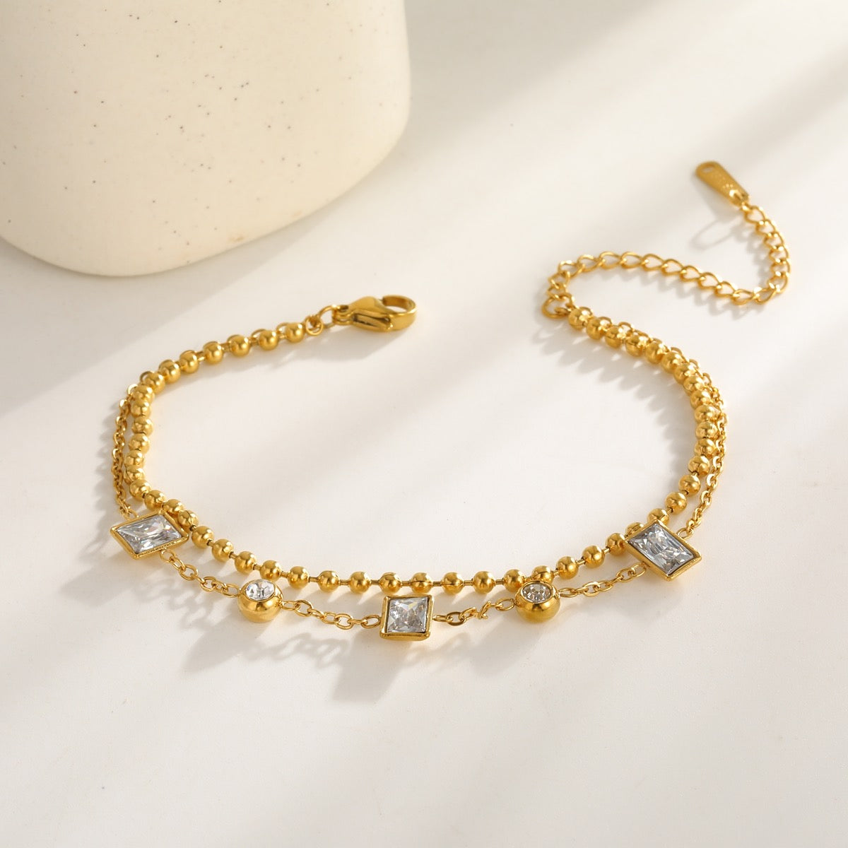 Pulsera doble con piedras dorado