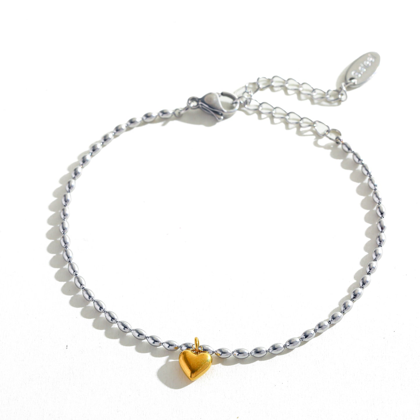 Pulsera plateada con corazon