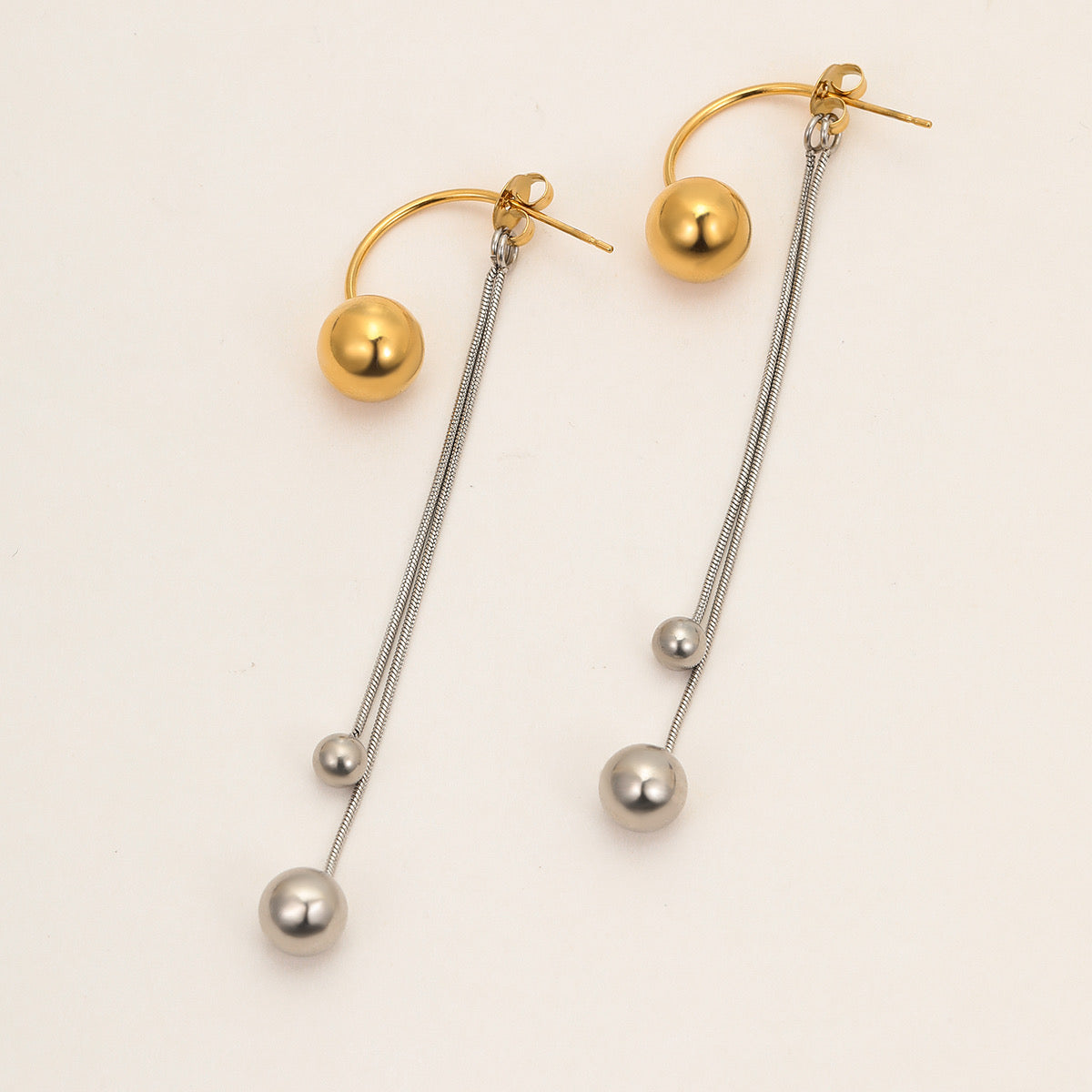 Aretes largos con círculos bicolor