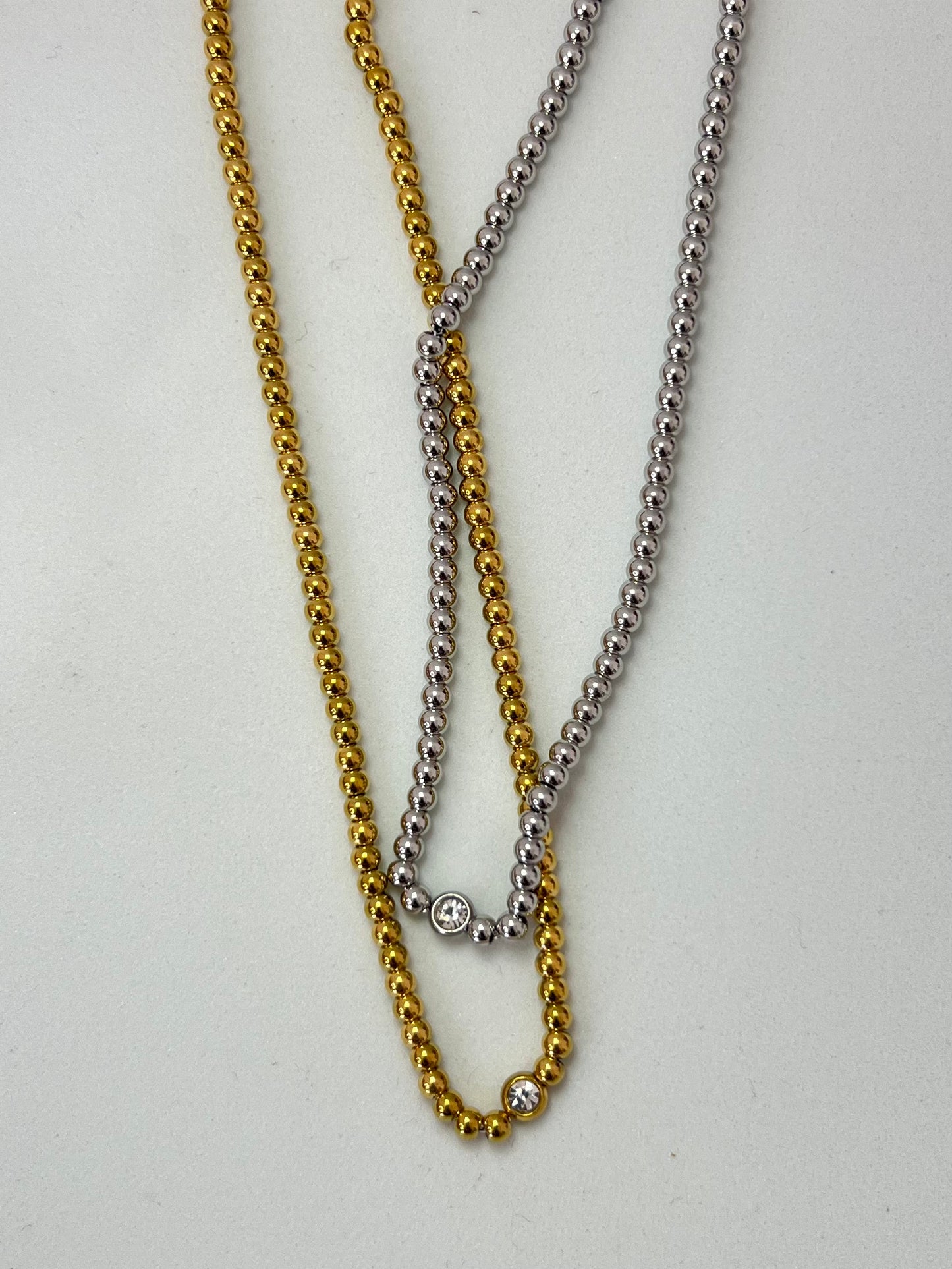 Cadena con círculos plata corta
