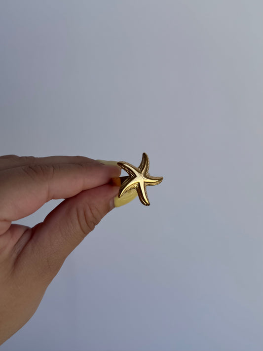 Anillo estrella dorado
