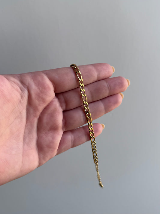 Pulso grueso figaro dorado