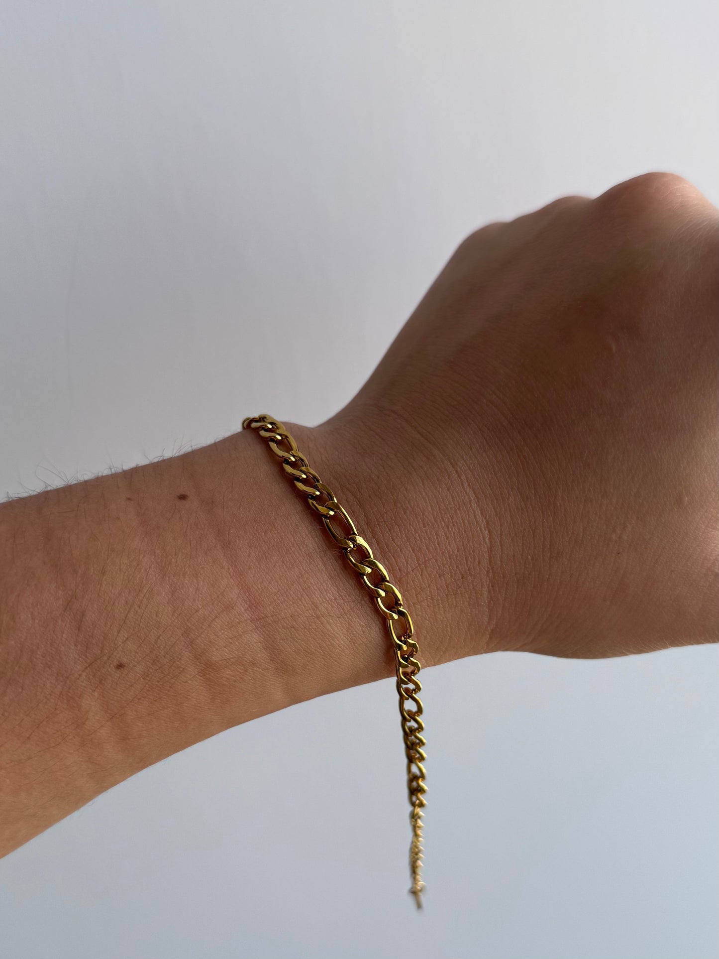 Pulso grueso figaro dorado