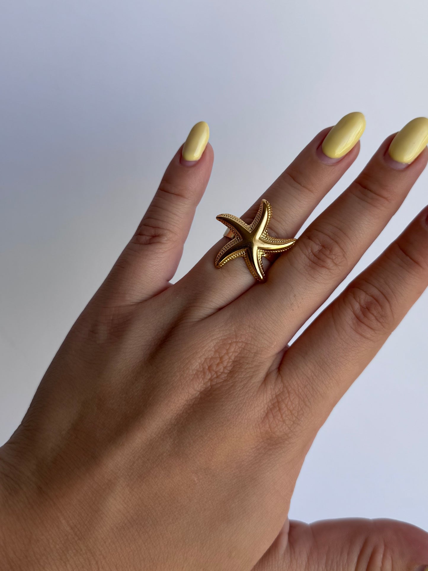 Anillo estrella dorado