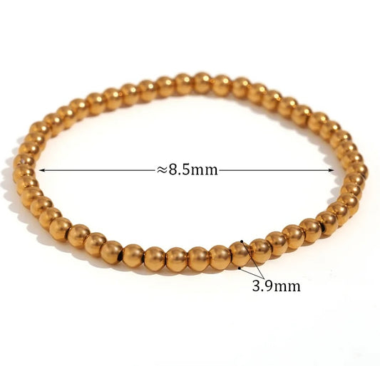 Pulsera bolitas dorado 4mm