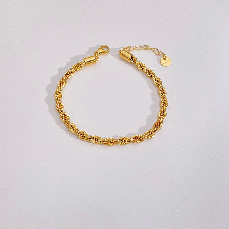 Pulsera tipo torzal dorada